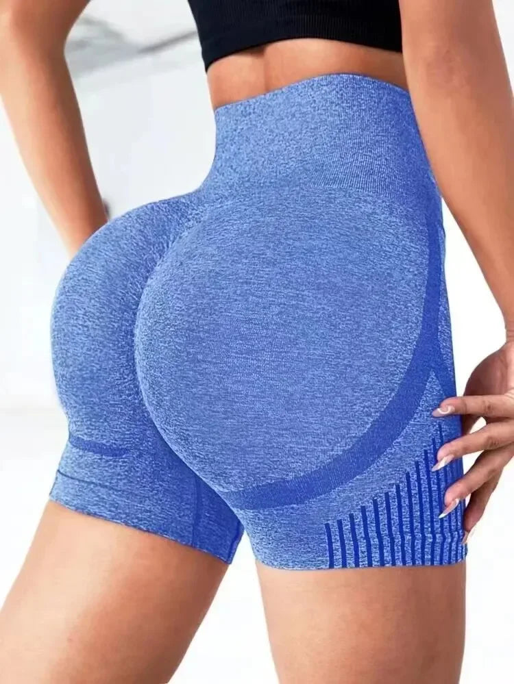 Apresentamos nosso Short de Yoga de Cintura Alta para Mulheres! 🧘‍♀️✨  🔹 Design que Valoriza: Eleva e modela o bumbum! 🔹 Conforto Inigualável: Tecido respirável e elástico. 🔹 Versatilidade: Perfeitas para o ginásio, corrida ou yoga.